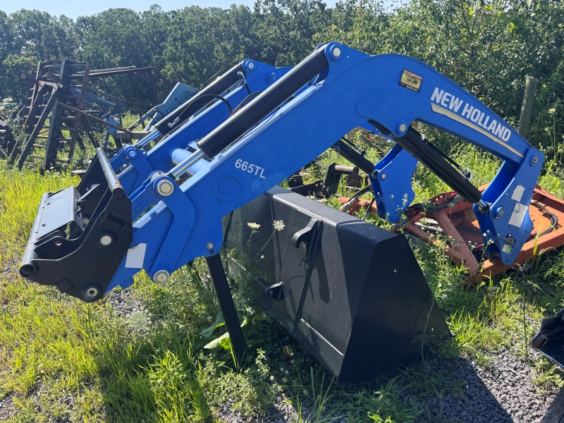 Used New Holland 665TL loader in stock at Baker & Sons Equipment in Ohio