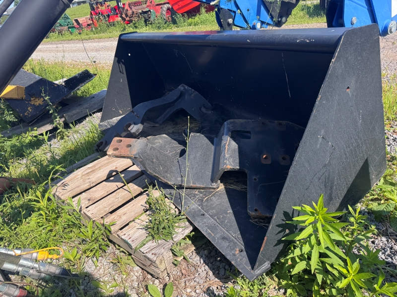 Used New Holland 665TL loader at Baker & Sons Equipment in Ohio