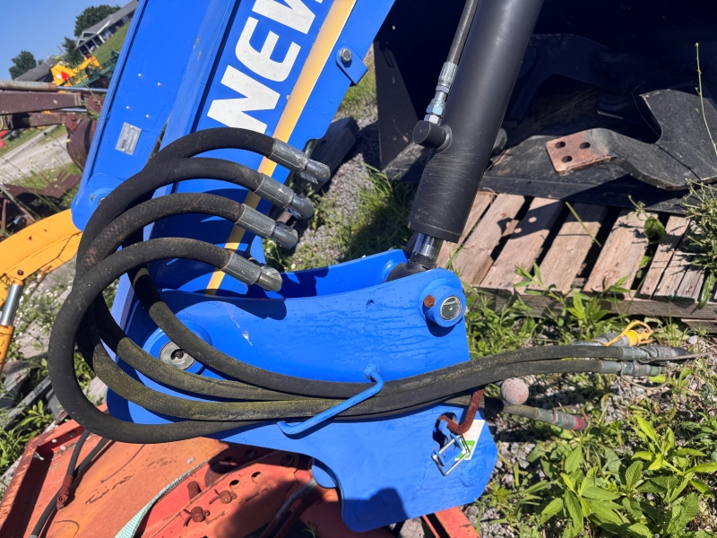 Used New Holland 665TL loader at Baker & Sons Equipment in Ohio