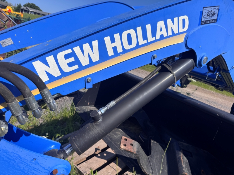 Used New Holland 665TL loader at Baker & Sons Equipment in Ohio