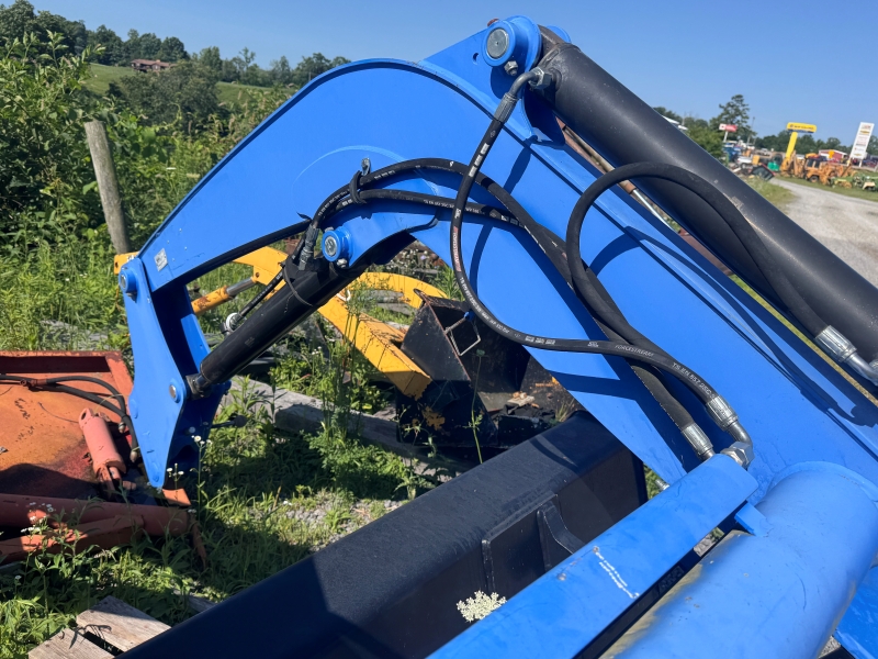 Used New Holland 665TL loader at Baker & Sons Equipment in Ohio