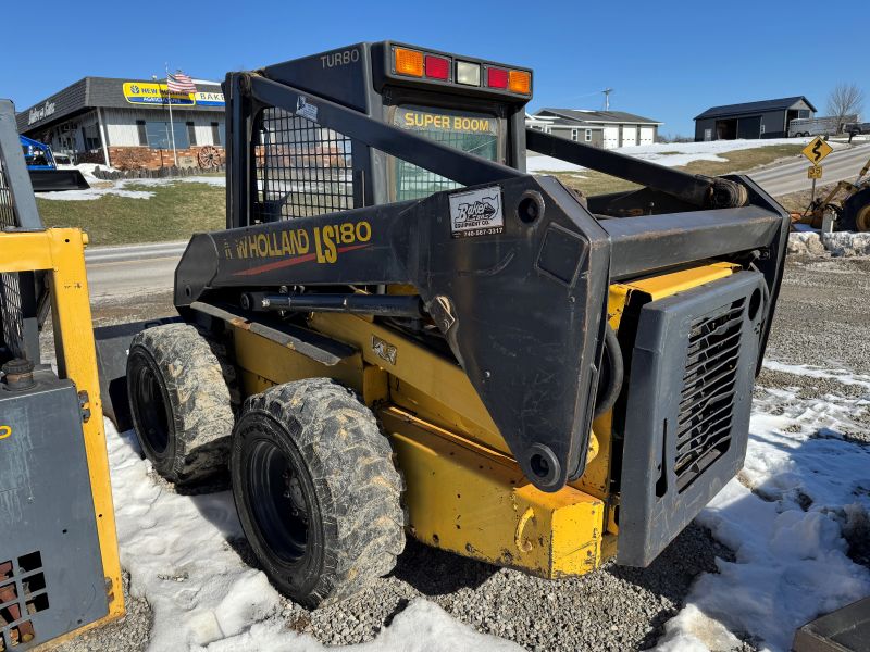 Used New Holland LS180 skidsteer for sale at Baker and Sons Equipment in Lewisville, Ohio