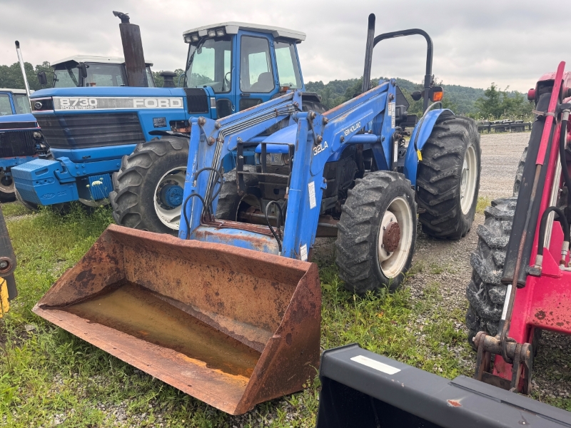 2000 New Holland TN75 tractor at Baker & Sons Equipment in Ohio