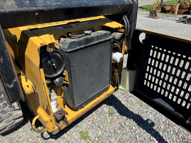 1997 New Holland L465 skidsteer for sale at Baker & Sons Equipment in Ohio