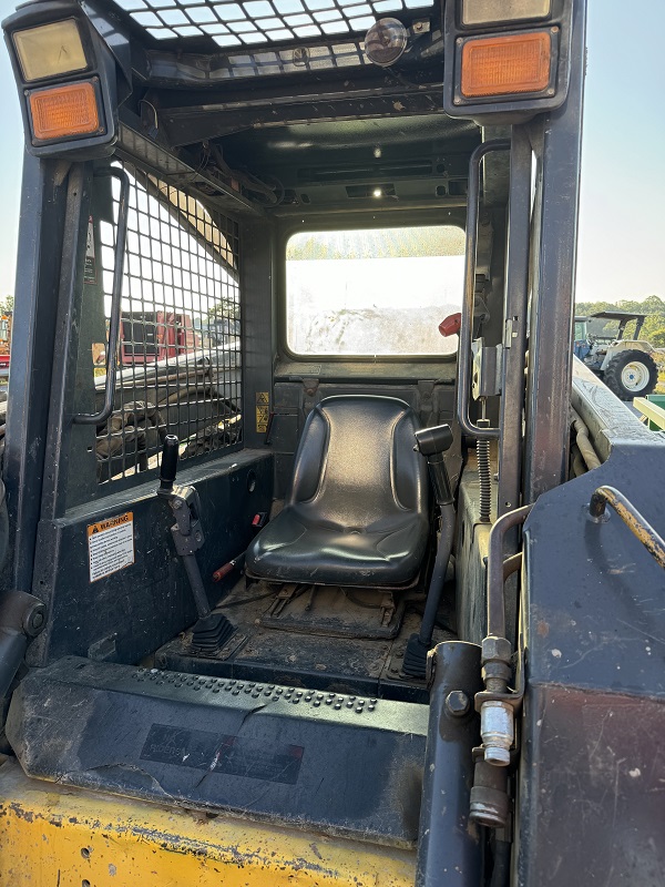 Used New Holland LS180 skidsteer for sale at Baker and Sons Equipment in Lewisville, Ohio