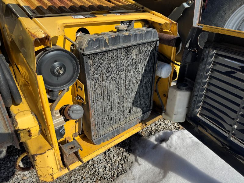 2001 New Holland LS170 skidsteer for sale at Baker and Sons Equipment in Lewisville, Ohio