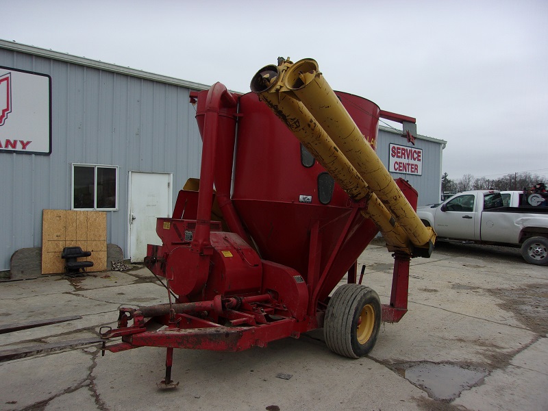 Used new holland 355 grinder mixer is for sale at baker and sons equipment in ohio