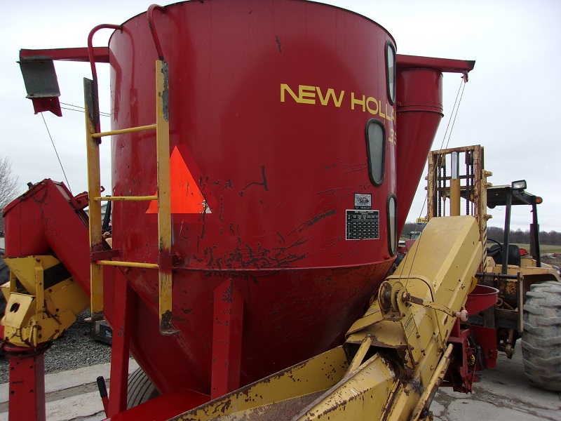 Used new holland 355 grinder mixer is in stock at baker and sons equipment in ohio